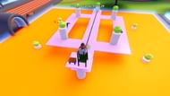 Playing "the floor is lava" in a player's Yard (Image via Roblox)
